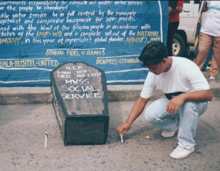 A public employee mourns the death of service to the people through MWSS' 1st day of privatization